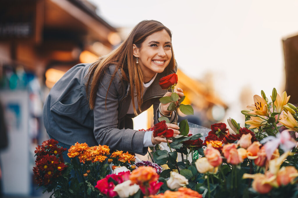 Customer buying roses at a flower shop